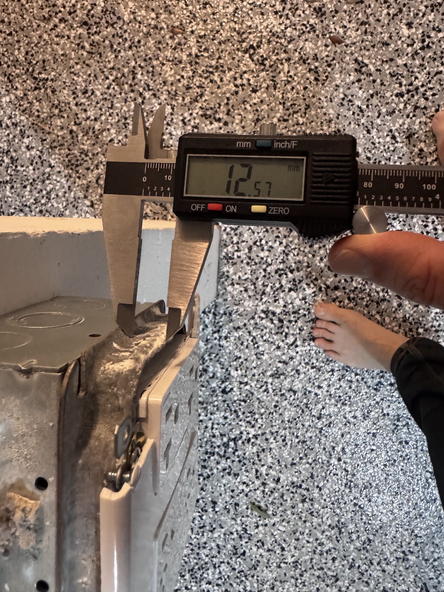 Calipers reading 12.57 mm